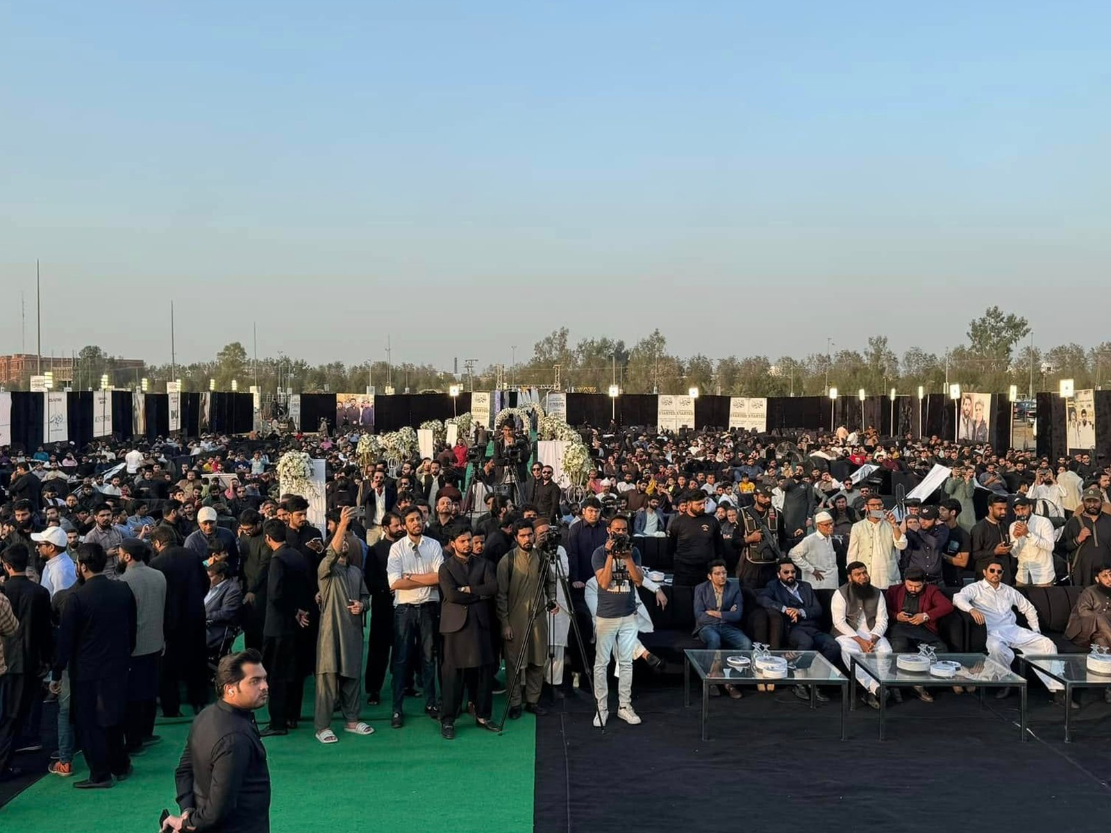 Attendees engaging post-program at Pearl One Courtyard milestone ceremony