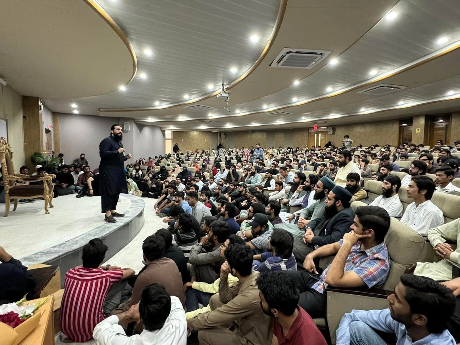 Wide view of a packed auditorium at the Youth Empowerment Session in University of Lahore