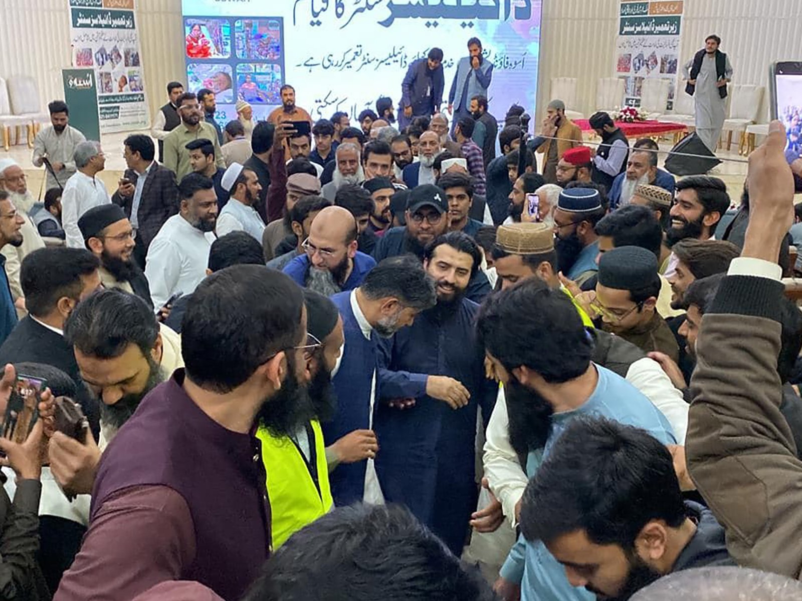 Attendees entering Sheikh Zayed Islamic Department for Uswah Program at Punjab University