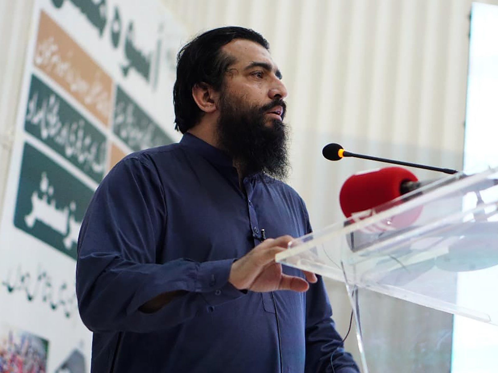 Shaykh Atif Ahmed delivering the opening remarks at the Uswah Program podium