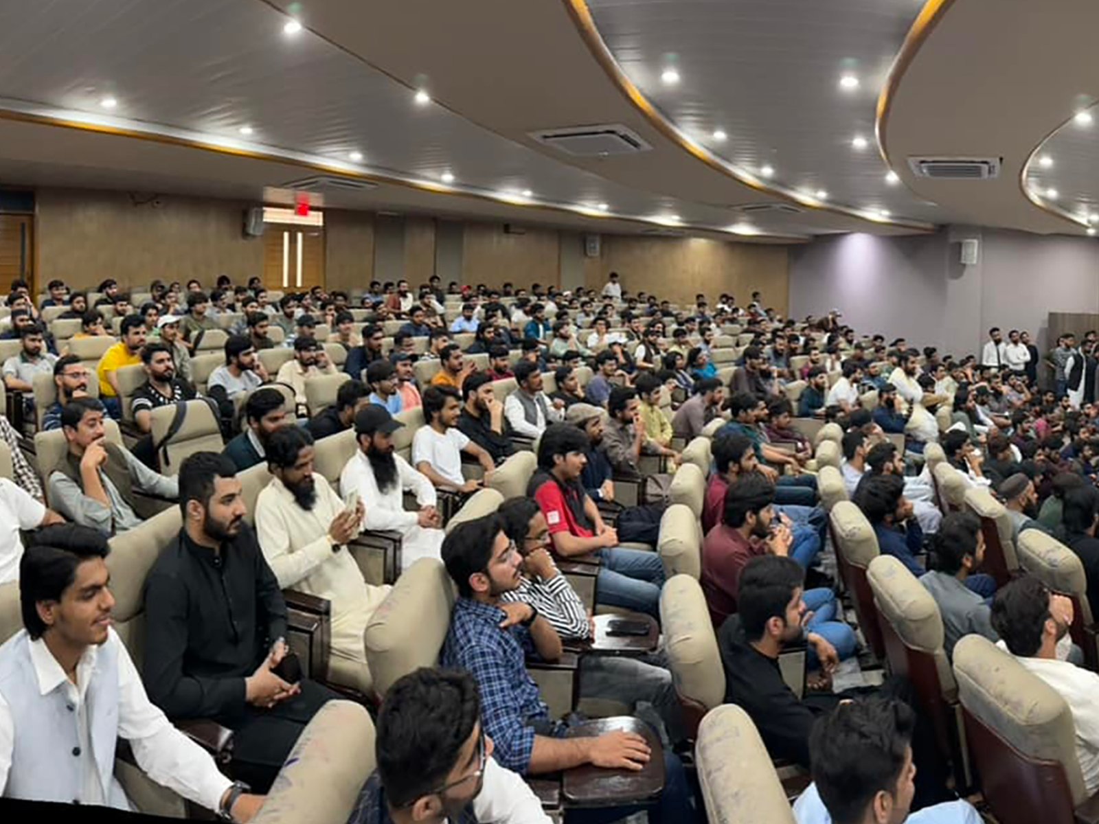 Speaker addressing students during Youth Empowerment Event at University of Lahore